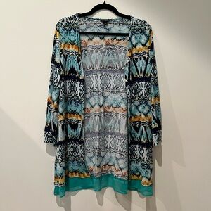 Women’s New Directions open front long sleeve geometric multi color top. Size L